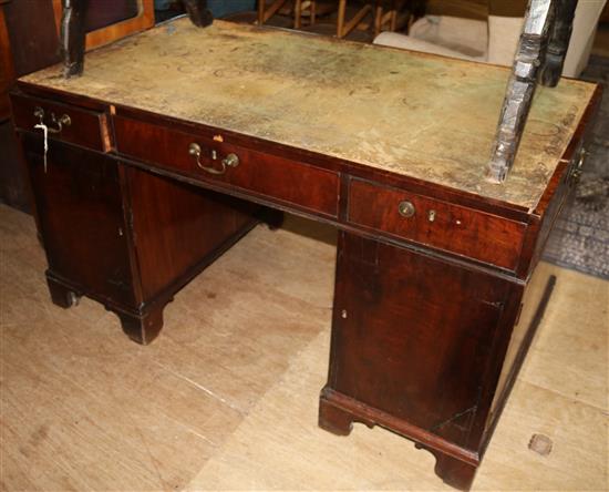 An early 19th century mahogany partners desk, W.4ft 6in. D.2ft 7in. H.2ft 6in.